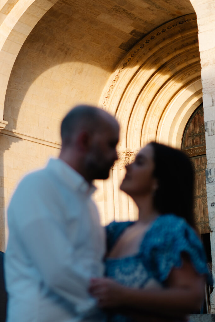 Couple embracing in Lisbon engagement photography